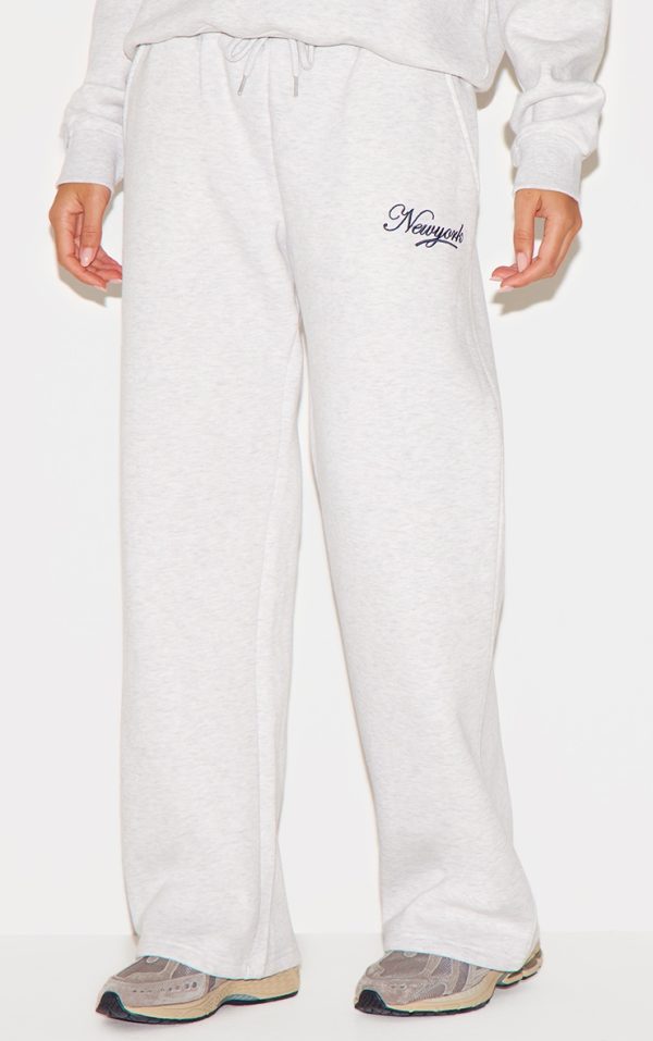 7567f36076d4d29758625870e0c67c11d2cc5905_CNL9633_2_cream_new_york_embroidered_wide_leg_joggers