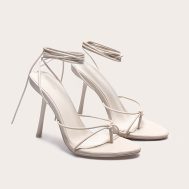 76f54e92ba3c260c629a31e41fd54778add97cf0_CNL8251_2_plt_label_stone_strappy_tie_thong_heels-1