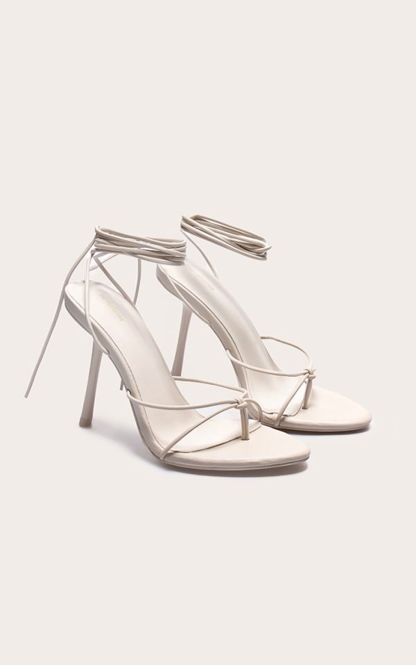 76f54e92ba3c260c629a31e41fd54778add97cf0_CNL8251_2_plt_label_stone_strappy_tie_thong_heels-1