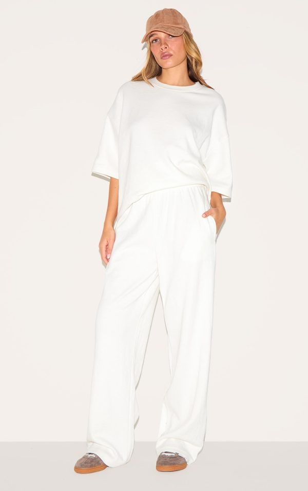 797cd66c3b740fae43336588fb9ad072a078d899_CNL8719_1_cream_jersey_mid_rise_wide_leg_trousers
