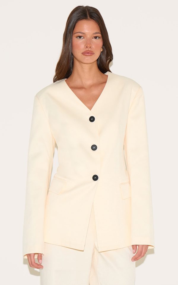 79980d62dd3b8b81e6eb3b07e8ba8aafa0cdd75d_CNM1820_1_sand_premium_tailored_collarless_button_up_fitted_blazer