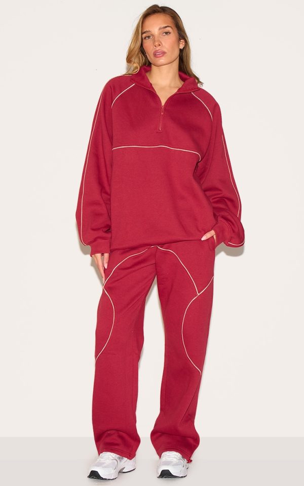 7c2930add5632d0b8b3df1ecd063eb3e1e169c96_CNM4812_3_red_oversized_contrast_piping_quarter_zip_sweatshirt