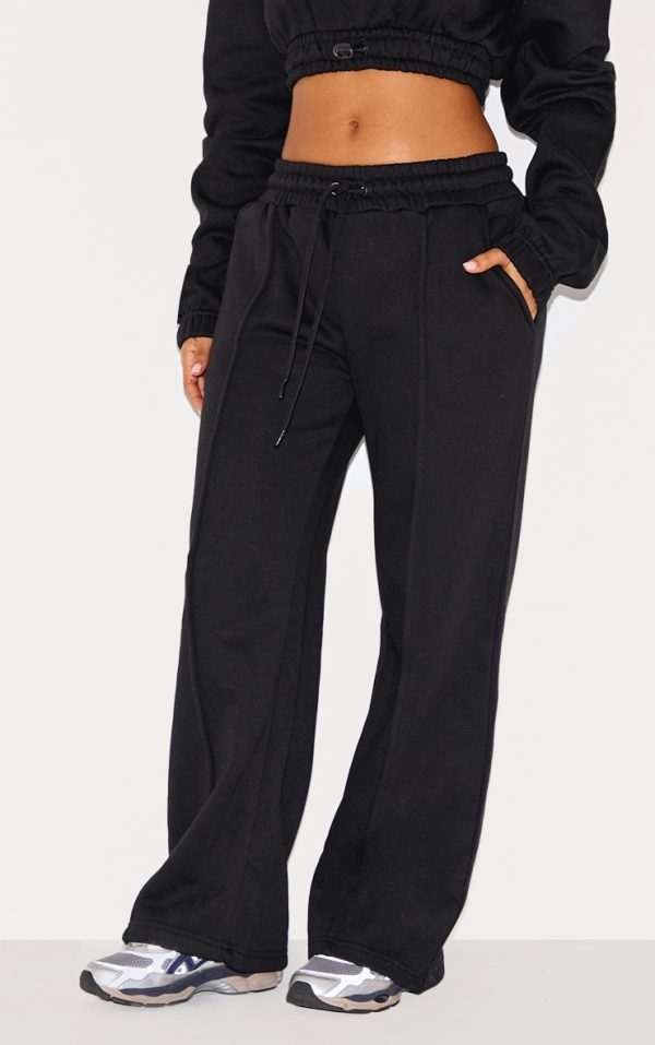 7df3f01b2524a20f7a284f2b7d0844480b4f6d52_CNG6139_2_petite_black_wide_leg_seam_detailed_joggers