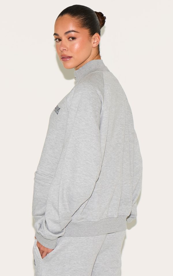 7e674be41433279cc2d78215f3e9e9b46e73807f_CNL9687_2_ash_grey_embroidered_boxy_track_top