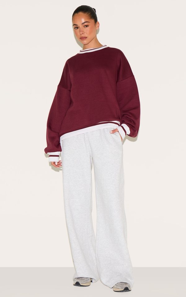 7f740da5f6407272b88cf5475bccd228123404b7_CNL4111_3_burgundy_striped_ribbed_hem_oversized_sweatshirt