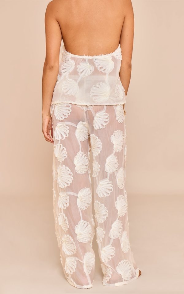 81cd6a6a8c9f9049d145678bc7a22d155dddf6c8_CNM7076_3_petite_cream_sheer_shell_applique_wide_leg_trousers