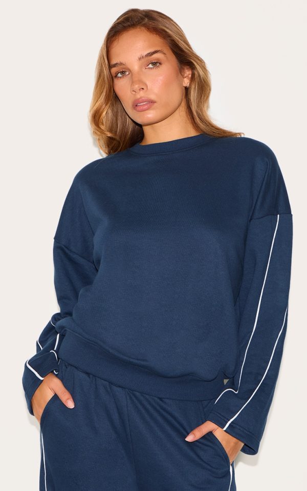 83323e5e03bf4e51dea06c870516a6305dd9a800_CNL8649_1_navy_contrast_piping_detail_sweatshirt