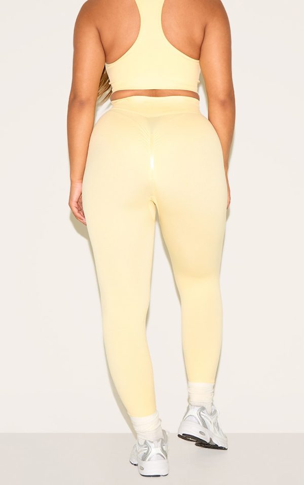 833834147a28bdaebd7eaa3e411af6e2c5b55f13_CNM8520_3_shape_butter_yellow_seamless_active_ruched_bum_high_waisted_leggings