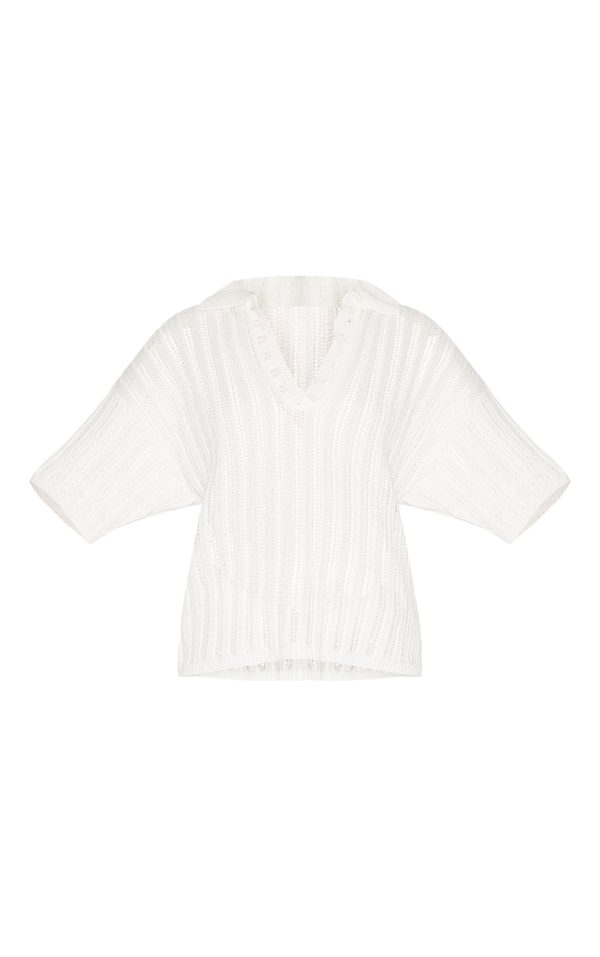 867306ed4b91cf99b04de7b3ecd50a5696f1f4ee_CNN2700_5_cream_crochet_rugby_knit_top