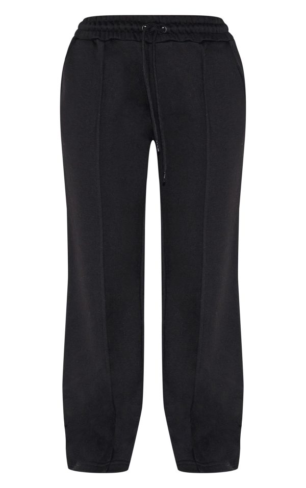 8b5ae982932bf474c424a121fed38c72300e4343_CNG6139_5_petite_black_wide_leg_seam_detailed_joggers