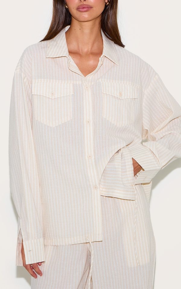 8ba39f0ffddb921ffc7829f0a76f5d4a29844329_CNL9425_4_stone_striped_linen_pocket_detail_oversized_shirt