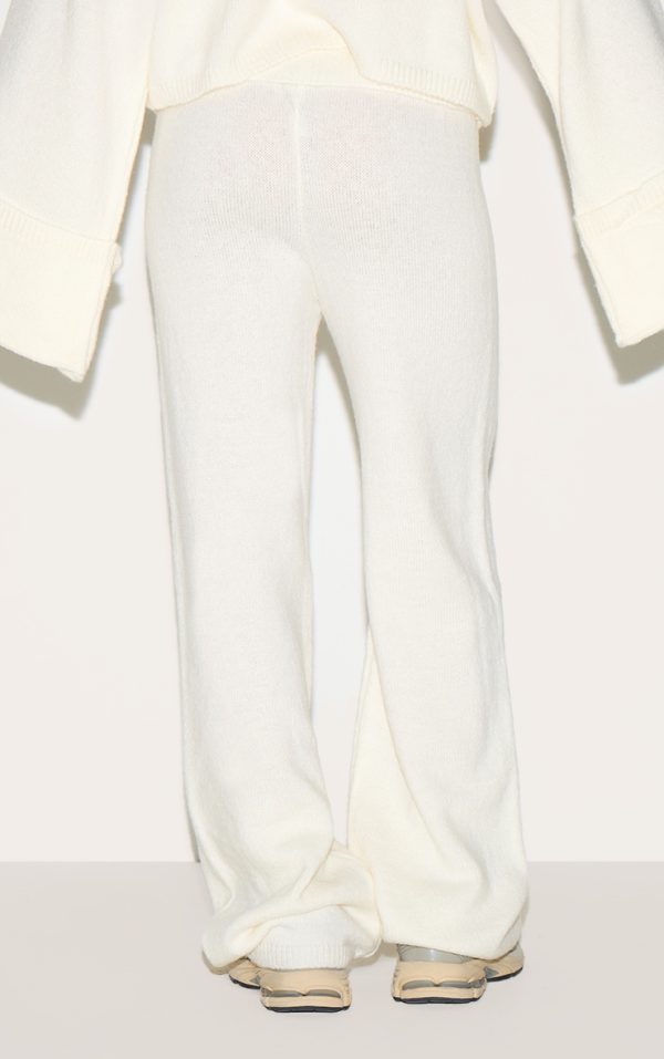 91f7e6afb954df9d374bdef25bb6605506ab4d5a_CNM1007_3_petite_cream_knitted_fold_over_flare_trousers