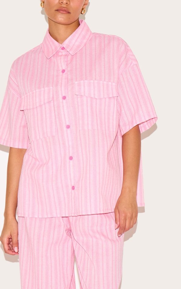 94286b670b0da3296de1b702e5edab7a838062f2_CNM4398_4_petite_pink_pinstripe_oversized_short_sleeve_shirt