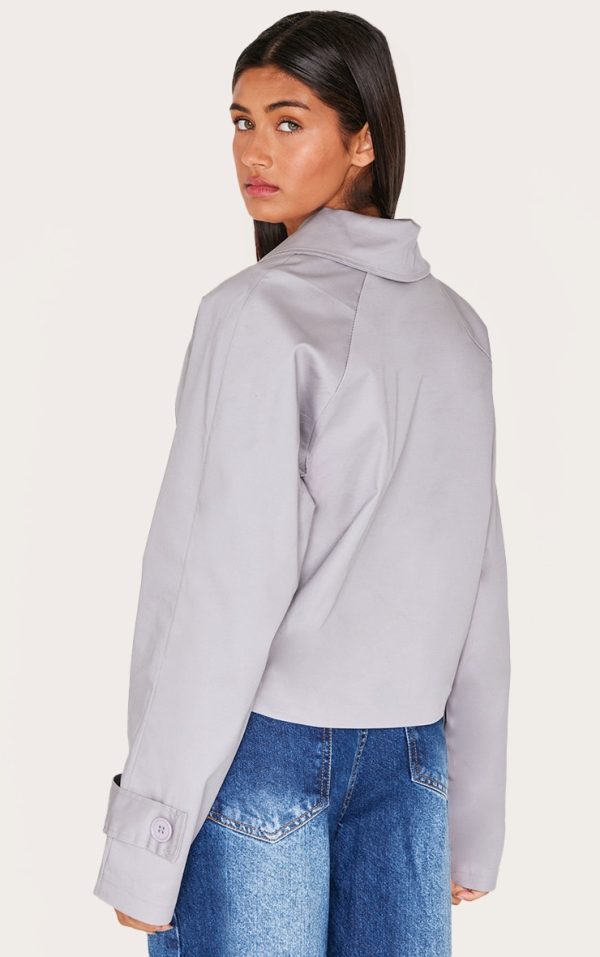 98867367b04bd96972bb27753f63373cb1eec118_CNL4973_2_grey_cropped_storm_flap_detail_trench_coat