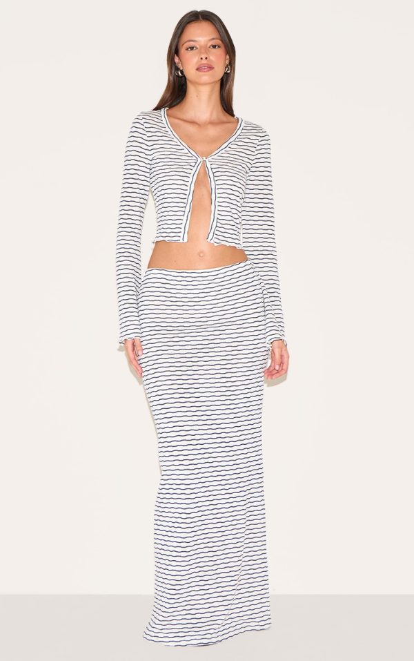 9b847f0e40b9ebf1d244f22939c1045b5ed0aaf8_CNM7409_3_navy_textured_striped_button_cardigan-1