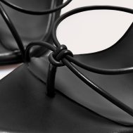 9ef7a4069222b2ad5547e76b35fcbca54573b5ba_CNL8253_4_plt_label_black_strappy_tie_thong_heel