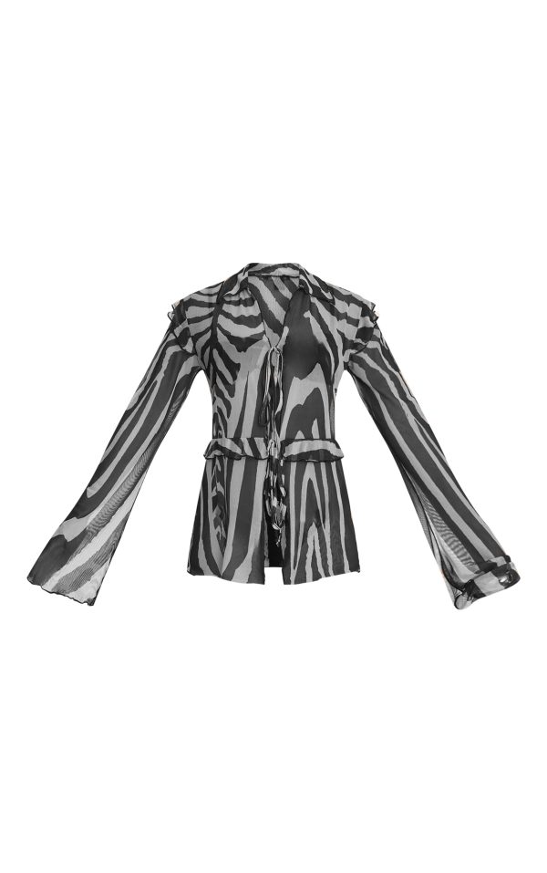 9f8a49e99a87205595972c9eb985e32f3fe1d47b_CNN0671_5_black_zebra_printed_mesh_frilly_tie_front_beach_top