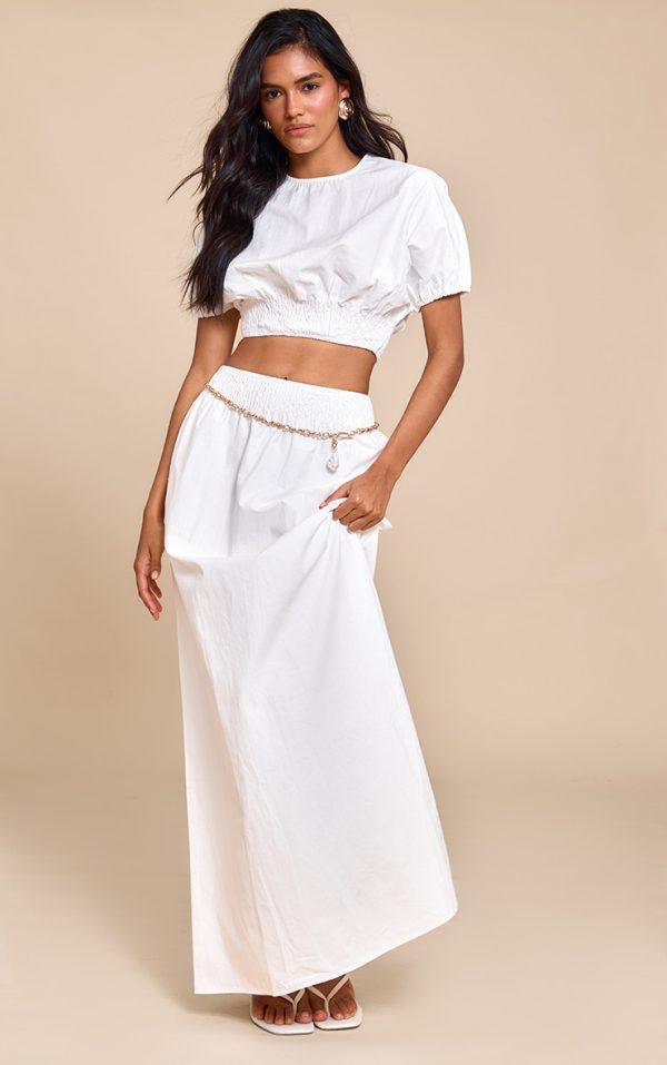 9f8c85934b015bca816d7ab70991e315ceca488b_CNM1728_3_white_shirred_waist_cap_sleeve_crop_top