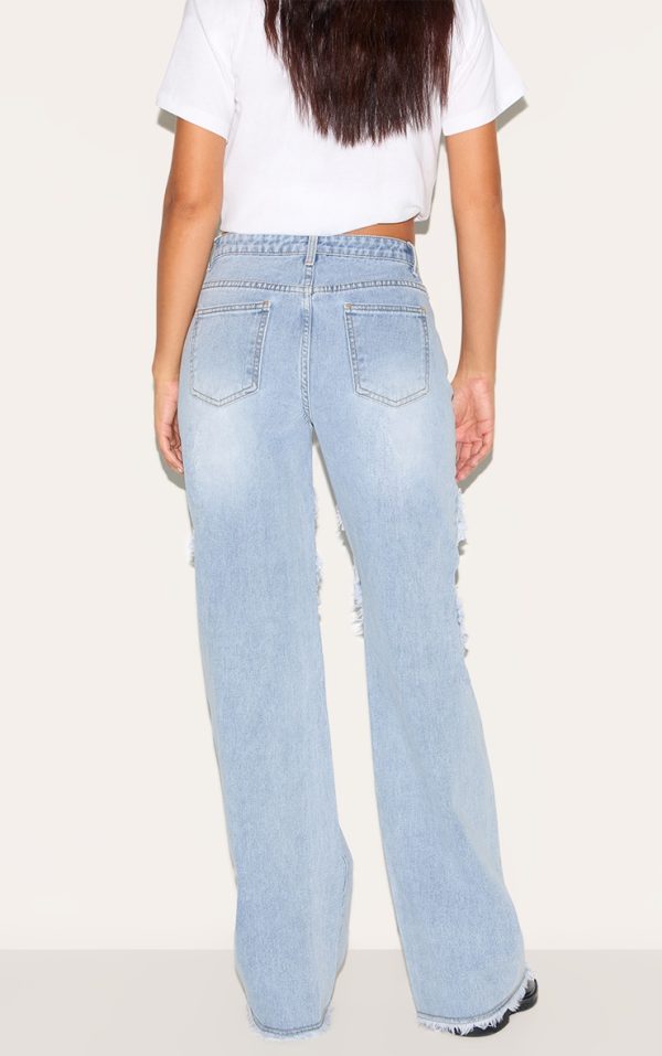 a28e681858ab91d0040f59b3631dc4c0a42b83c9_CNM1188_3_tall_light_blue_wash_mid_rise_raw_seam_detail_wide_leg_jeans