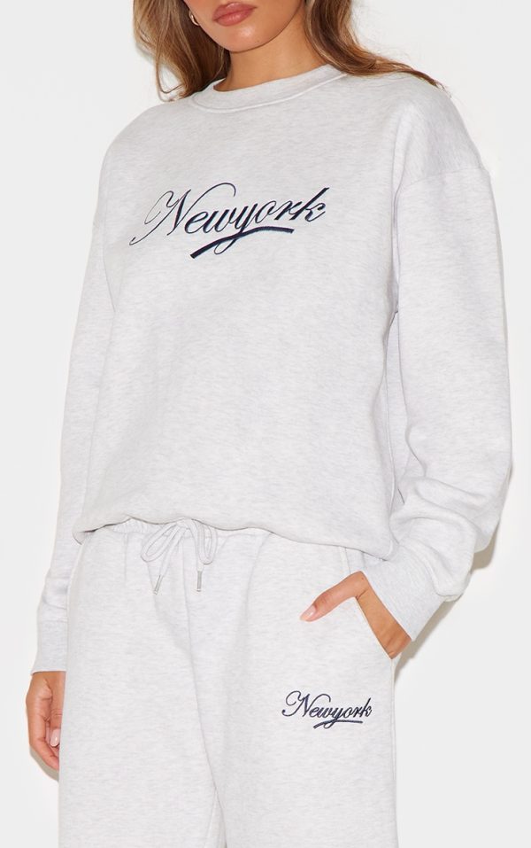 a35c6e740d1ac855562de8d9f3c5d22219a4fdaa_CNL9633_4_cream_new_york_embroidered_wide_leg_joggers