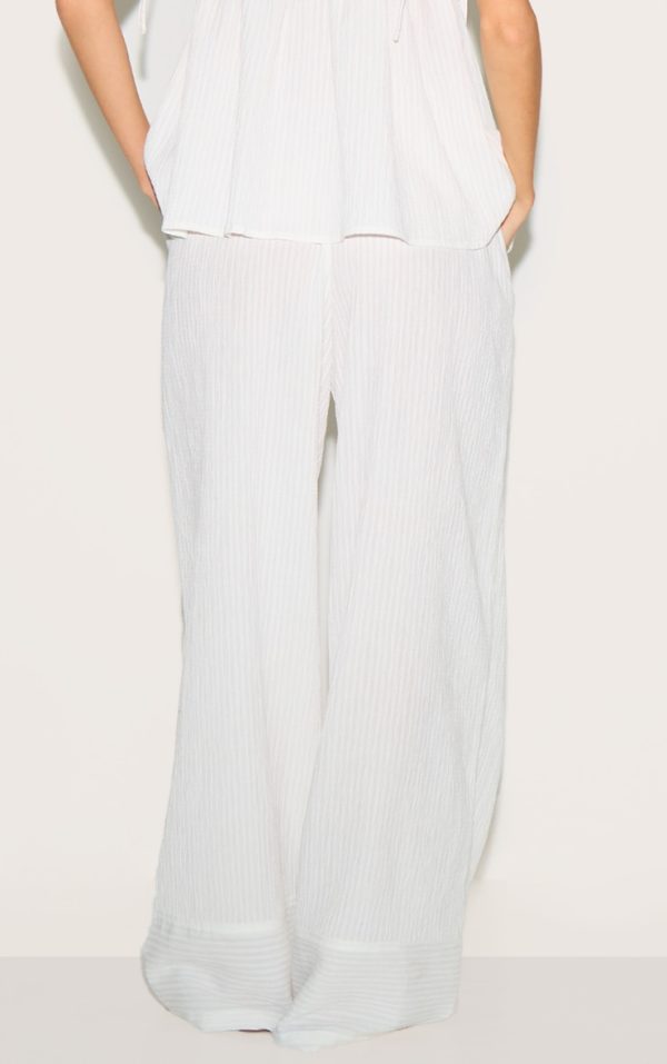 a3905bc616f3853970f94acfab724c840dedfcf4_CNM1912_3_white_woven_textured_straight_leg_trousers