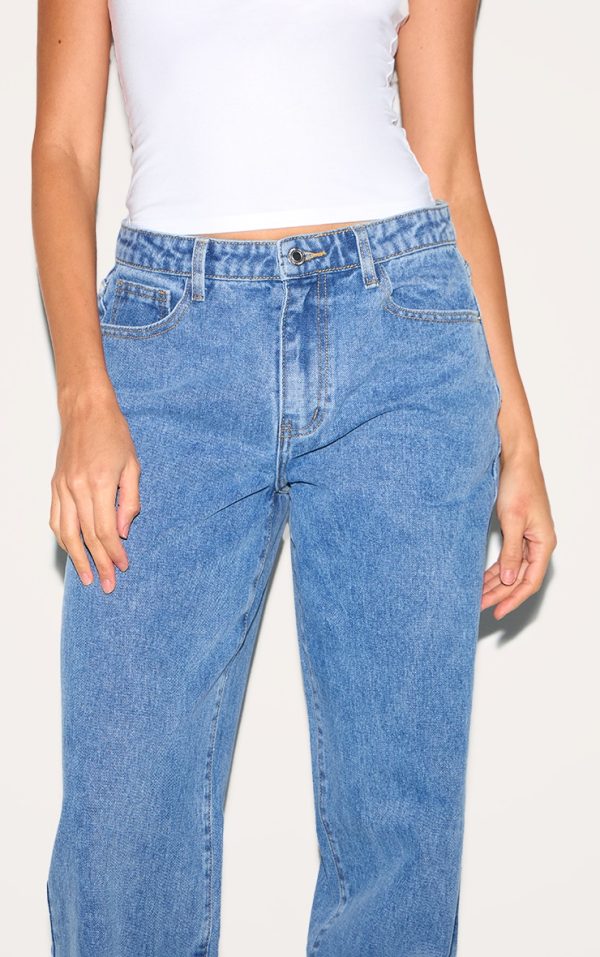 a44c9f8d703c8378e551a5fea2e95cc870aefa51_CNM0602_4_mid_blue_wash_mid_rise_straight_leg_jeans