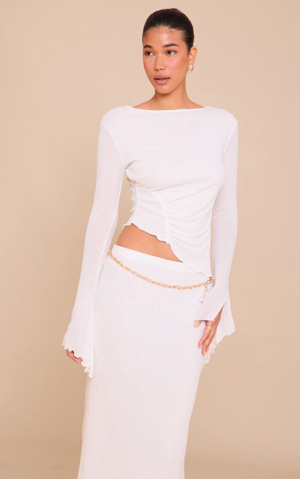 a8774fc51b50ca853993d7ea2b8f77748b768fdd_CNM9923_1_white_burnout_mesh_ruched_front_flared_sleeve_long_top