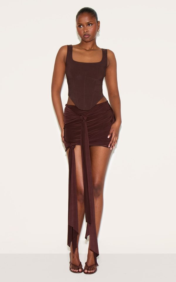 a8906580169b0e9755ad9a36e5284df5070a425b_CNM7958_1_chocolate_double_layer_slinky_knot_detail_mini_skirt