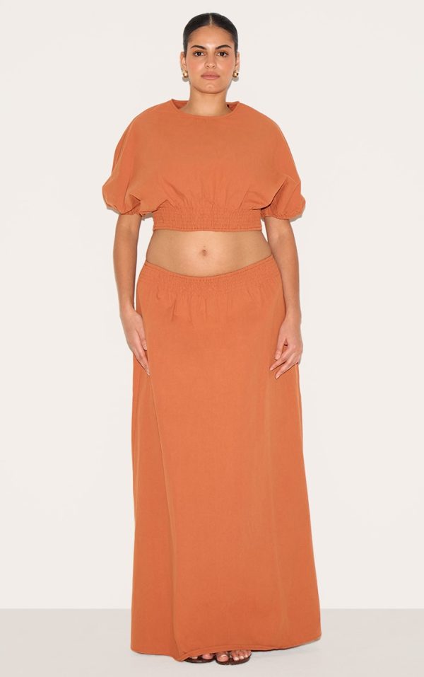aa4f1d049122d47f0aefaabb17e9335413054a54_CNM3422_3_plus_burnt_orange_sheered_waist_cap_sleeve_crop_top