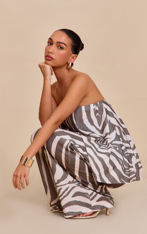 af618f8be0d5d74bd8a8834b0b0568a5e0a20acd_CNM8793_4_brown_oversized_zebra_print_trousers