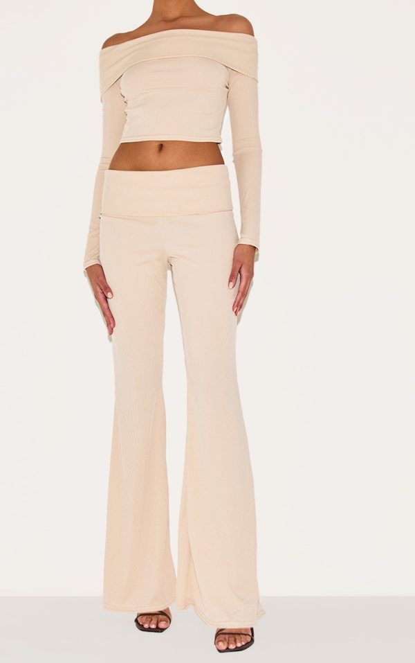 b09723a7ebd900ae268f15dee9b43204c7cdd72b_CNL2586_2_beige_rib_low_rise_foldover_flared_trousers
