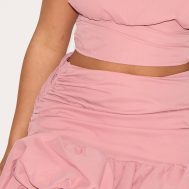 b1f047edfa1866c1eb3f44b23c331e8ca347e7f6_CNM6474_5_shape_rose_ruched_dropped_hem_puffball_mini_skirt