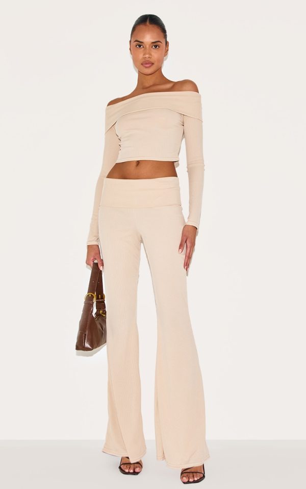 b567496b503114ee7ba34f8326f1f3542be537bb_CNL2586_1_beige_rib_low_rise_foldover_flared_trousers