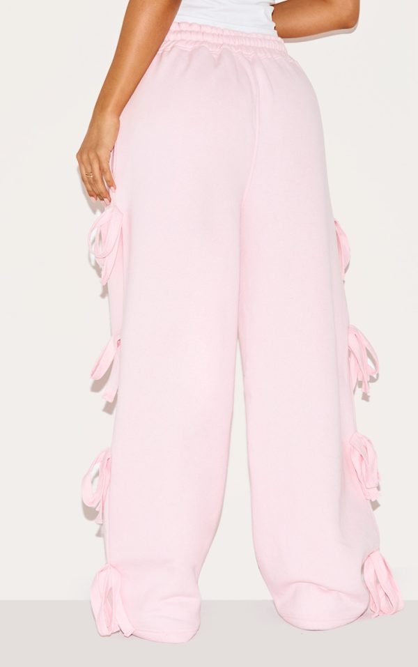 ba450ea6cf677b97c3f7c159a38141541739b517_CNK0422_3_petite_baby_pink_wide_leg_joggers_with_bow_details
