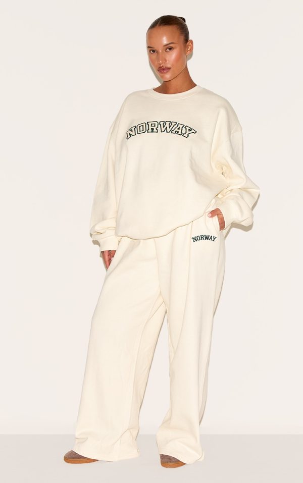 ba8eda8aca3cccc1a28a421e7c6f3759dc5f94ab_CNM1363_1_plus_cream_premium_embroidered_norway_wide_leg_jogger