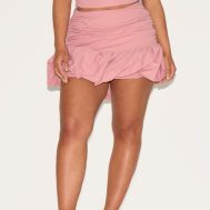 c0f173c3e22c47d7ab2a7bcd85bc60b544f9aa87_CNM6474_2_shape_rose_ruched_dropped_hem_puffball_mini_skirt