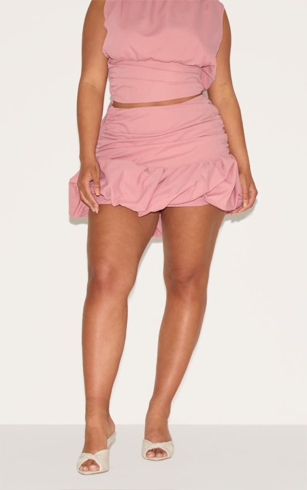 c0f173c3e22c47d7ab2a7bcd85bc60b544f9aa87_CNM6474_2_shape_rose_ruched_dropped_hem_puffball_mini_skirt