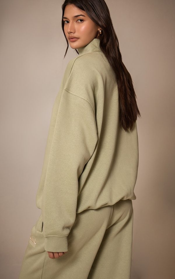 c245c82232f9429fedd645f0087006c26158cddc_CNM0179_2_sage_embroidered_half_zip_sweatshirt