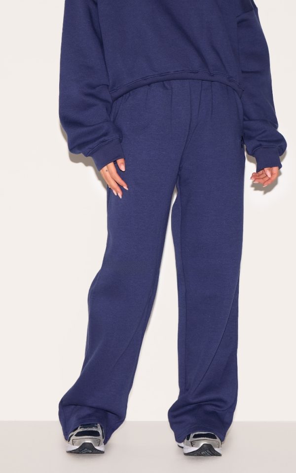 c492aaf69165c349809902979745a6d599baf3c3_CNK6320_2_prettylittlething_navy_wide_leg_embroidered_joggers