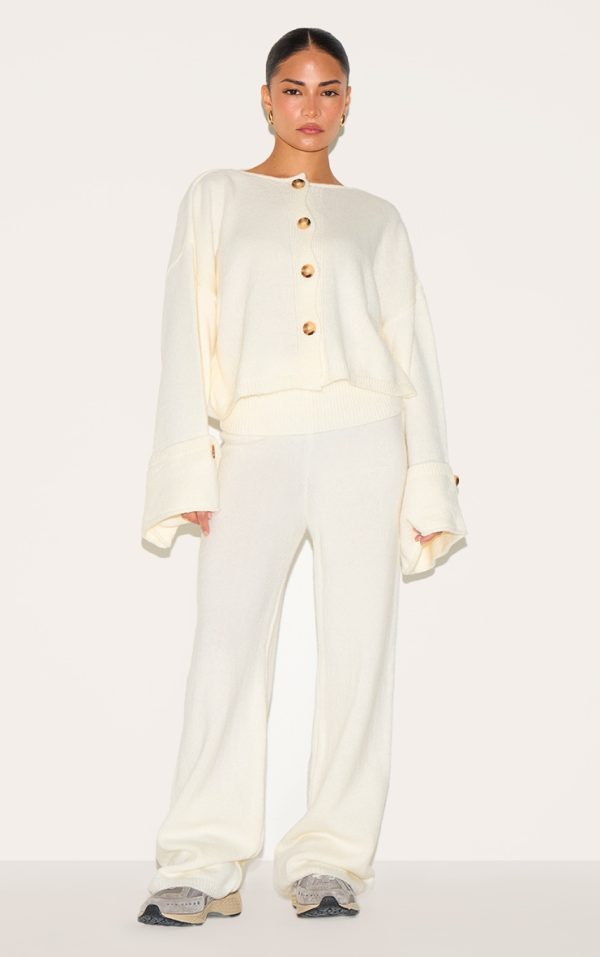 c80531c13a968bef945d6bb63ce966bd00d7ab7d_CNM1007_1_petite_cream_knitted_fold_over_flare_trousers