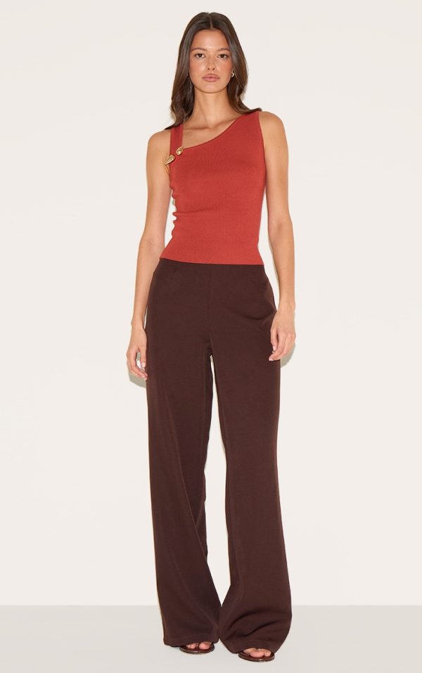 c989ad99dd4f8c99167d4da0182775c8d487701e_CNL7644_3_rust_fine_knit_gold_trim_asymetric_neckline_top