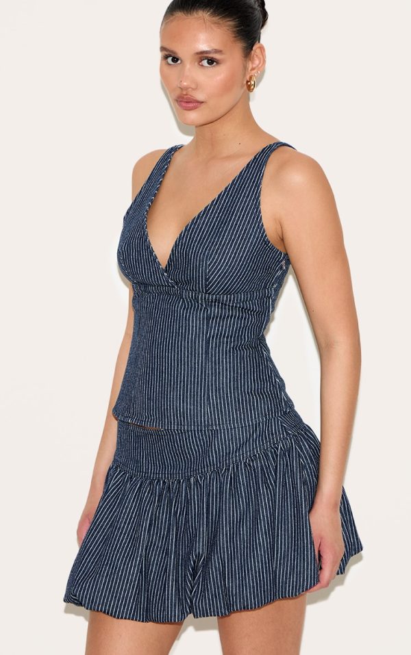 ca4eb2871c65bce5f8f58bedad04c95af84b6648_CNL7944_1_navy_pinstripe_plunge_denim_crop_top