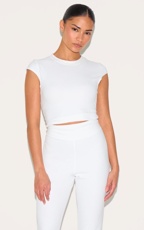 d1d0f0e395efddf435b59876c00604723d3da9aa_CNK9468_4_petite_white_contour_sculpt_flared_trousers