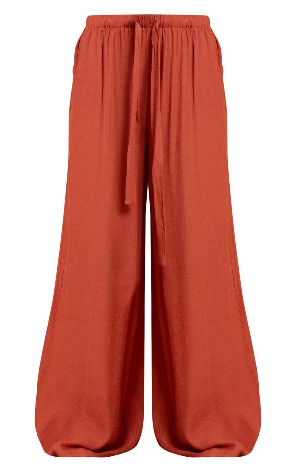 d613914d5bad892651102081823eff61231084c2_CNN1445_5_rust_linen_look_palazzo_beach_trousers