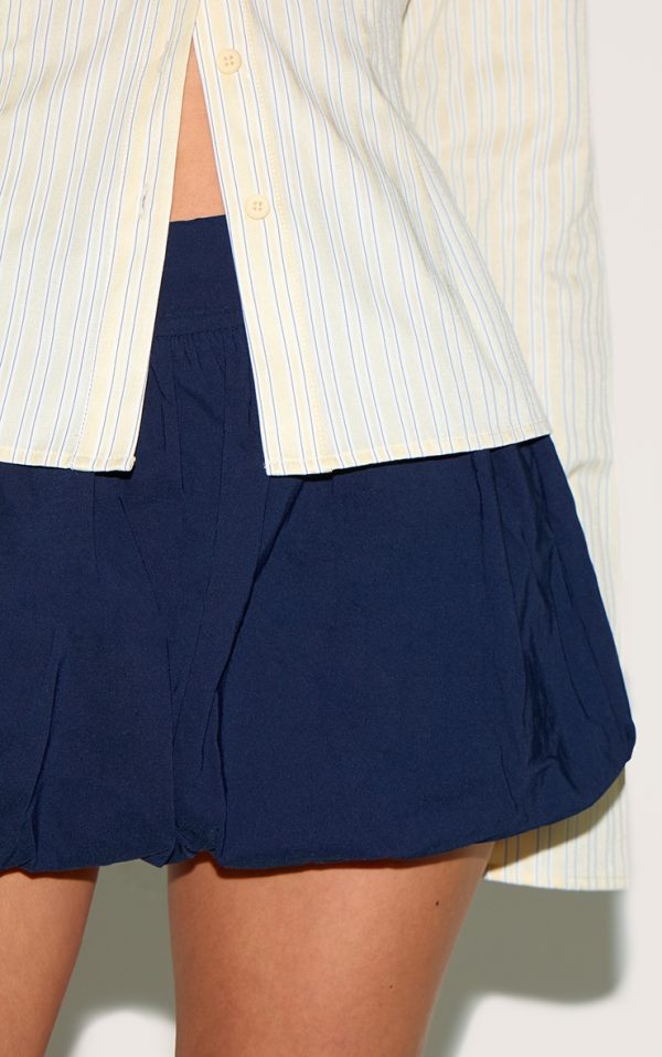 d7bea06c87a3d614e753895a4ccb14b4bfa09ff5_CNM2338_5_navy_stretch_woven_micro_mini_puffball_skirt-1