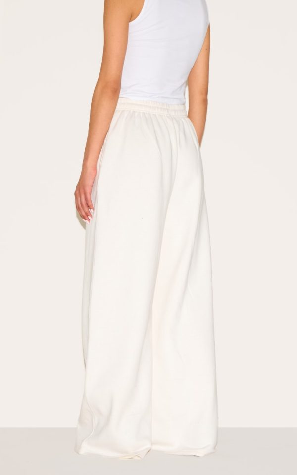d7def596f551070e30bd59ff5d61c96203e850e8_CNM7568_3_tall_cream_extreme_wide_leg_joggers