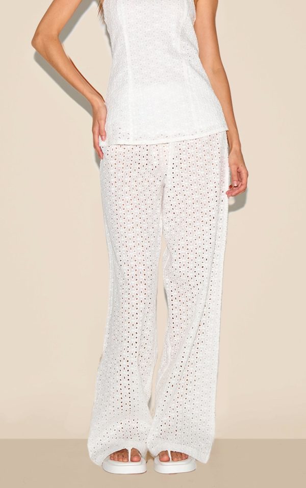 d89267b9af33bad27024219df76444657fc7a6b8_CNM3200_1_white_embroidered_mid_rise_trousers