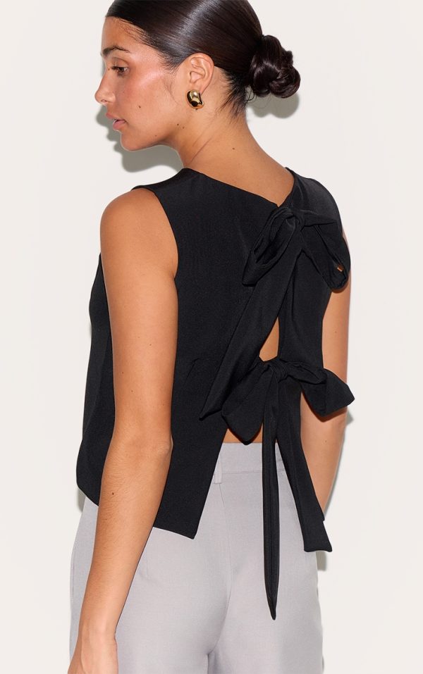 d8ab9e555e3aa36ff15f107513c74f45f6c80412_CNM9015_1_petite_black_sleeveless_bow_detail_top