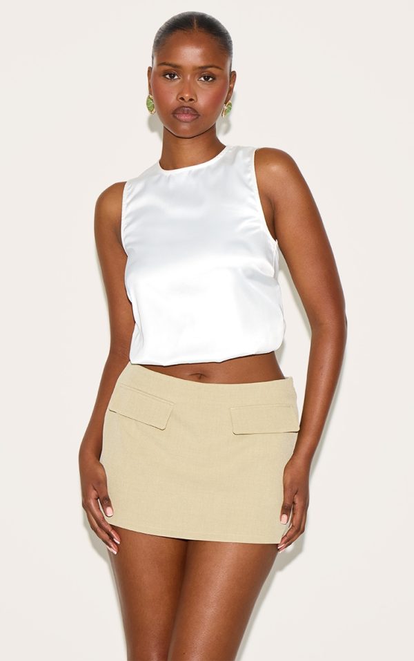 dbe4420f86209be59fcf3c5016e725c6a400d543_CNL9117_2_sage_green_pocket_detail_structured_tailored_woven_mini_skirt-1