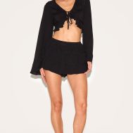 dc2c07e092bbaa32f4bd33a5d42bf98fb2735a21_CNM3228_3_black_cheesecloth_ruffle_tie_front_long_sleeve_top
